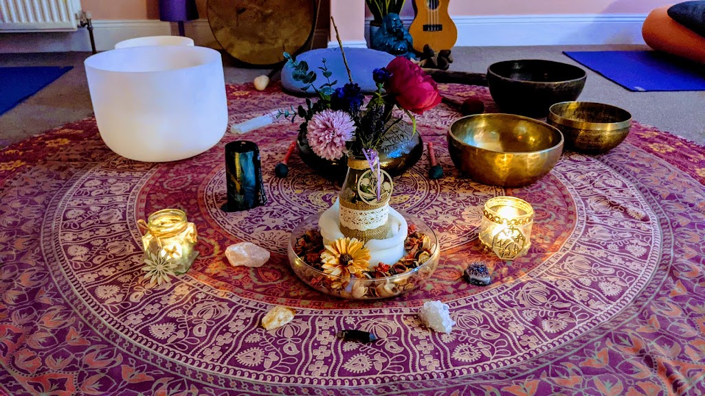 Emma facilitating a Sound Healing session with bowls